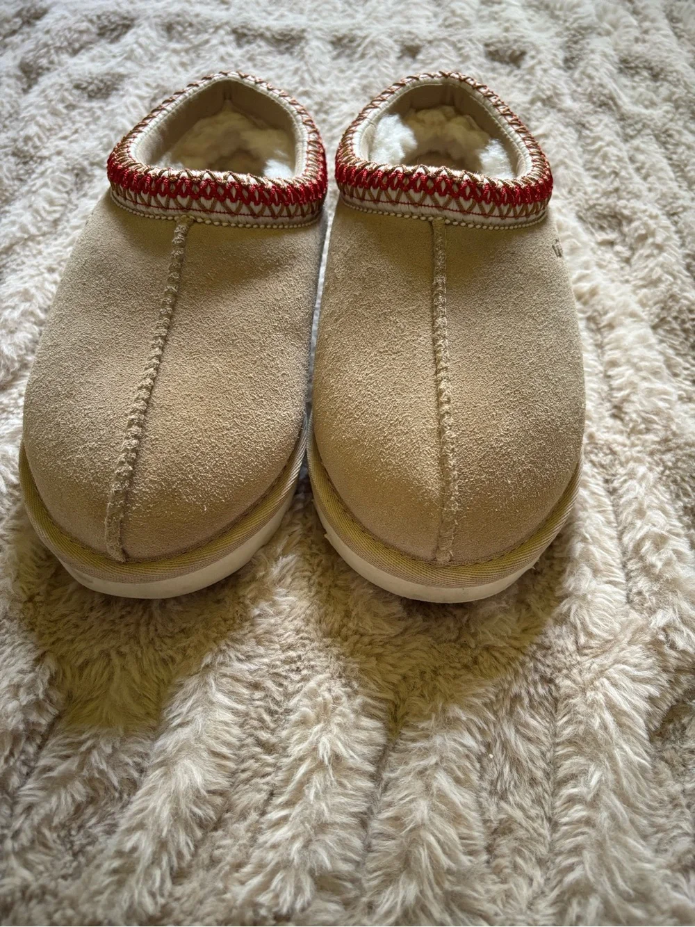 UGG Kids Tan Shearling Slip-On Slippers with Red Trim